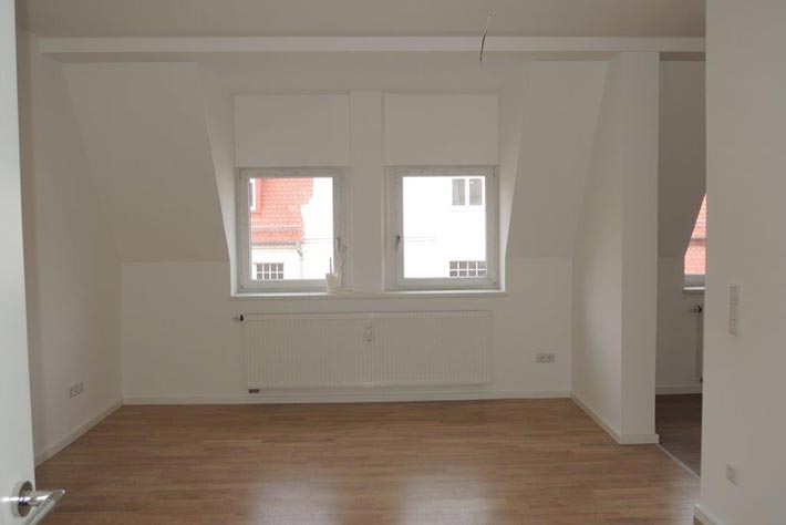 Komplettinnen- und Hofsanierung mit Anbau Balkone